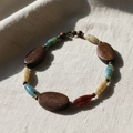 Tidal Drift Wood & Agate Bracelet on white linen flat lay